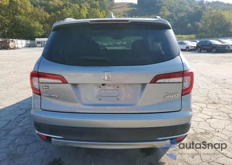 2021 Honda Pilot Touring z USA, uszkodzony, nr VIN 5FNYF6H65MB055578